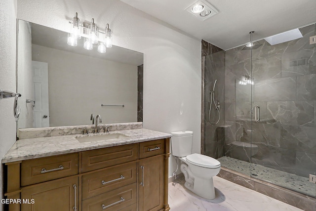 bathroom featuring vanity, a marble finish shower, marble finish floor, and toilet