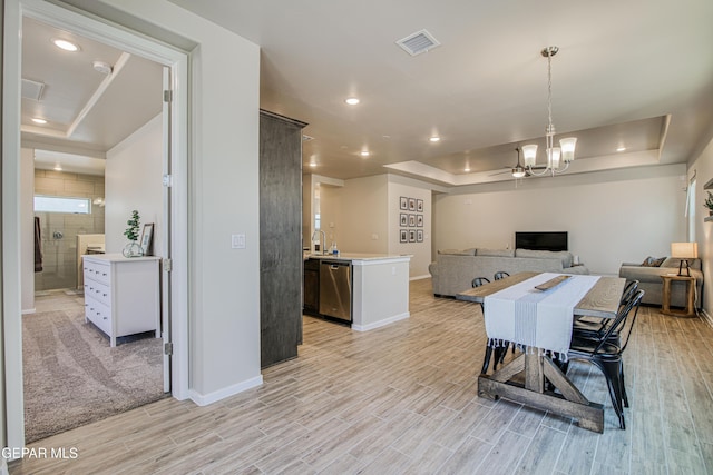 951 Airship Pl, El Paso, TX 79928 - dining room featuring a raised ceiling, baseboards, light wood-style flooring, and recessed lighting