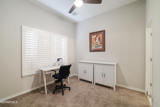 7825 Enchanted Ridge Dr, El Paso, TX 79911 - office featuring light carpet, baseboards, ceiling fan, and visible vents