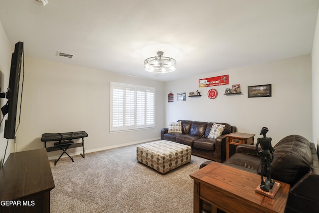 7825 Enchanted Ridge Dr, El Paso, TX 79911 - living area with baseboards, visible vents, carpet, and a notable chandelier