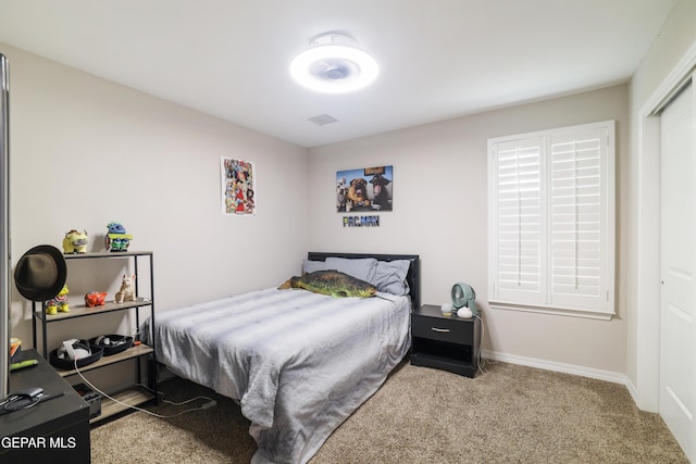 7825 Enchanted Ridge Dr, El Paso, TX 79911 - carpeted bedroom with baseboards, visible vents, and a closet