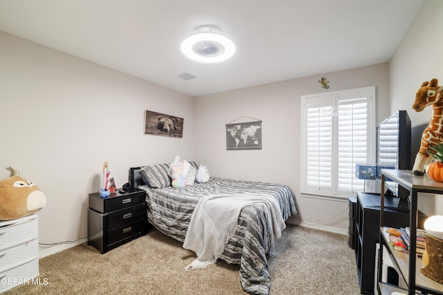 7825 Enchanted Ridge Dr, El Paso, TX 79911 - bedroom featuring baseboards, visible vents, and light colored carpet
