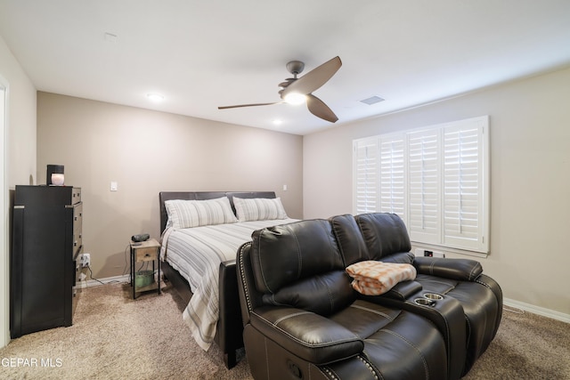 7825 Enchanted Ridge Dr, El Paso, TX 79911 - bedroom with visible vents, light carpet, a ceiling fan, and baseboards
