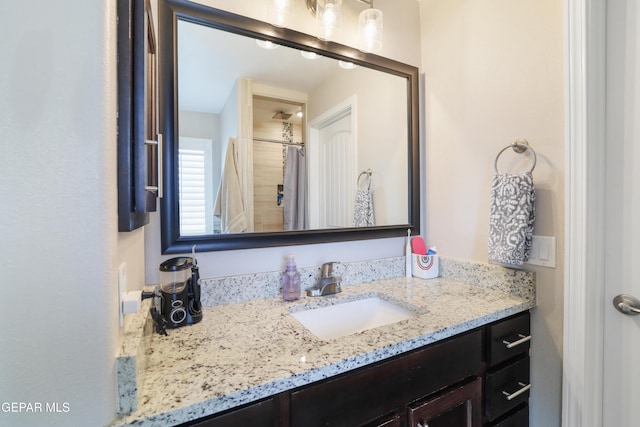 7825 Enchanted Ridge Dr, El Paso, TX 79911 - bathroom featuring vanity and a shower with shower curtain
