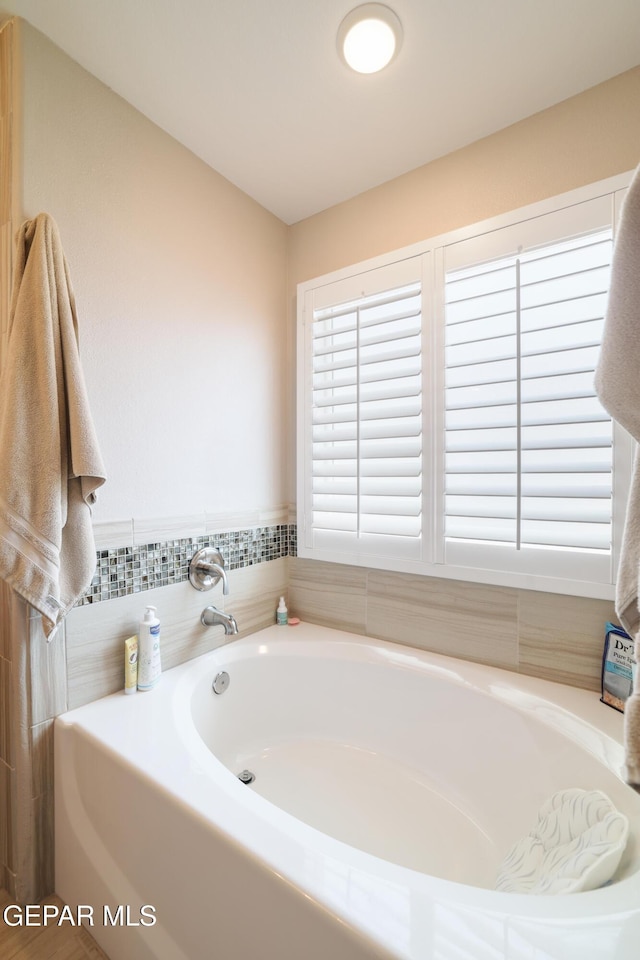 7825 Enchanted Ridge Dr, El Paso, TX 79911 - full bathroom featuring a bath