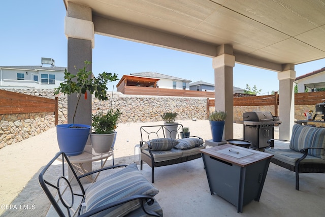 7825 Enchanted Ridge Dr, El Paso, TX 79911 - view of patio / terrace with a fenced backyard, an outdoor hangout area, and area for grilling