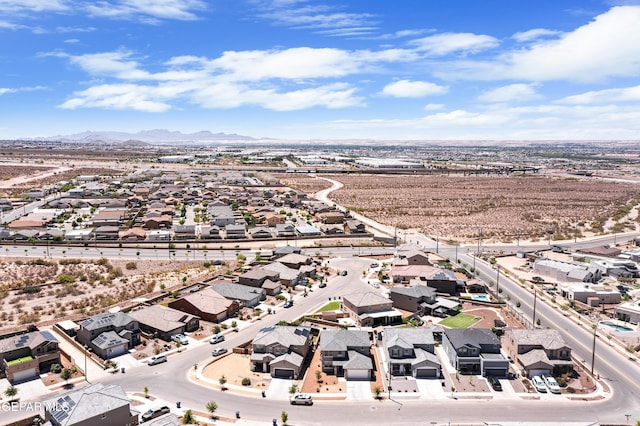birds eye view of property featuring a mountain view and a residential view