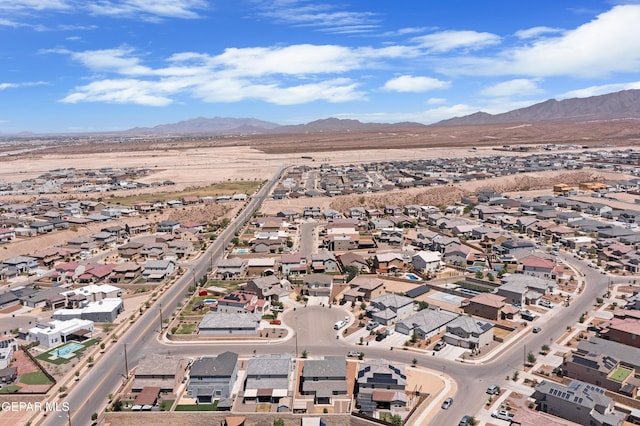 drone / aerial view featuring a mountain view and a residential view