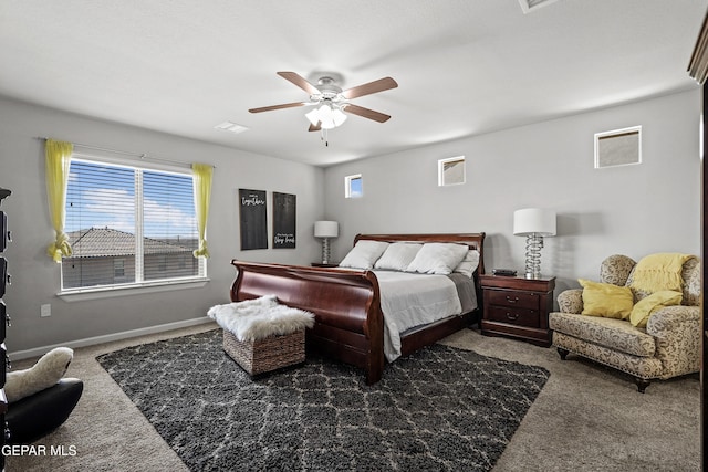 bedroom with visible vents, ceiling fan, carpet, and baseboards