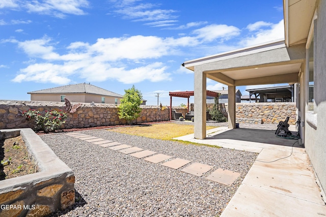 view of yard with a patio and a fenced backyard