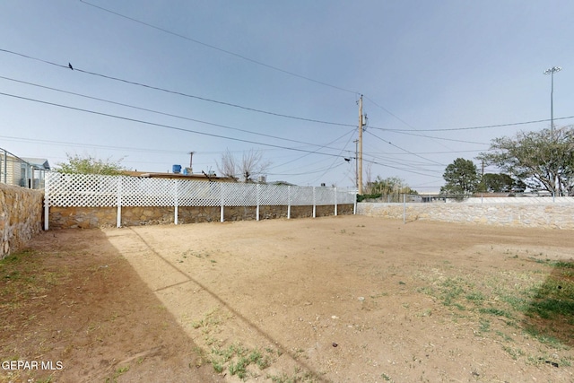view of yard featuring fence