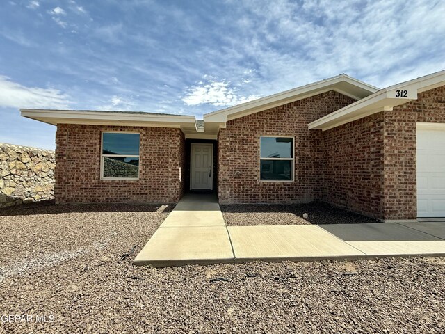 312 Via Cumbre Linda Cir, El Paso, TX 79928 - exterior space with brick siding and a garage