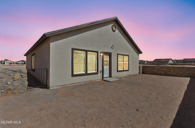 1205 Night Sky St, Horizon City, TX 79928 - back of property featuring stucco siding and a patio