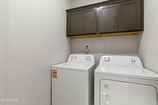 1205 Night Sky St, Horizon City, TX 79928 - washroom with cabinet space and washing machine and dryer
