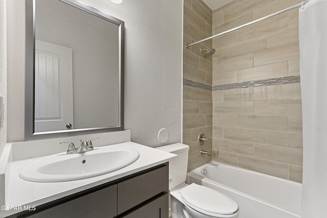 1205 Night Sky St, Horizon City, TX 79928 - full bath with toilet, a textured wall, vanity, and shower / bath combo with shower curtain