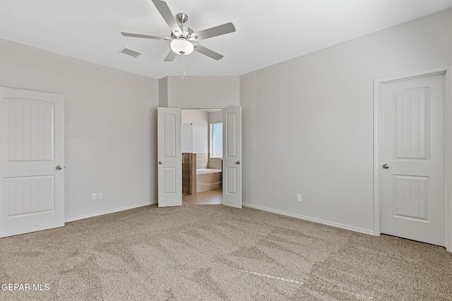 1205 Night Sky St, Horizon City, TX 79928 - unfurnished bedroom featuring ensuite bath, visible vents, carpet flooring, and baseboards