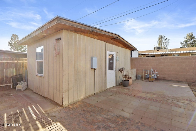 view of outbuilding with a fenced backyard