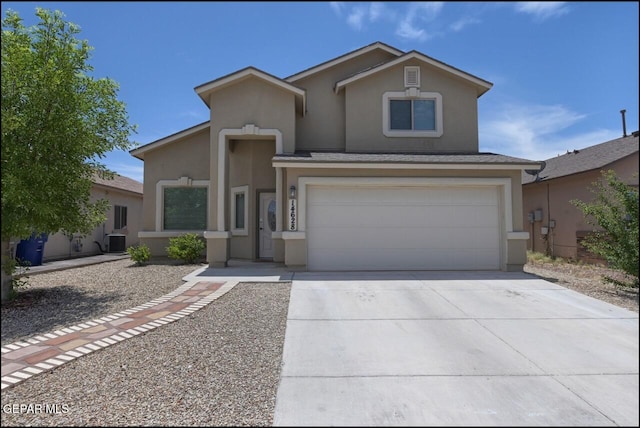 traditional-style house featuring cooling unit, driveway, a garage, and stucco siding