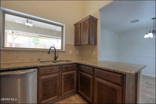 kitchen with light stone countertops, a sink, tasteful backsplash, visible vents, and stainless steel dishwasher