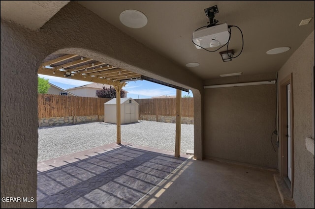 view of patio featuring a fenced backyard, an outbuilding, and a storage shed