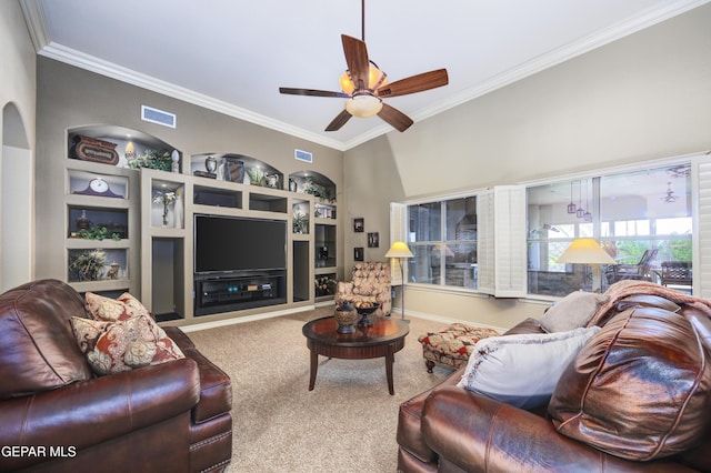 living room with a ceiling fan, crown molding, visible vents, and carpet