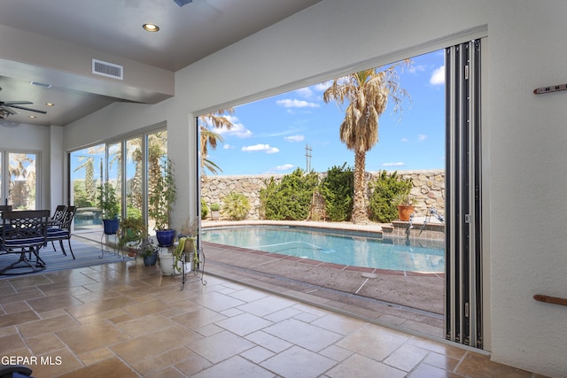 view of pool featuring a ceiling fan