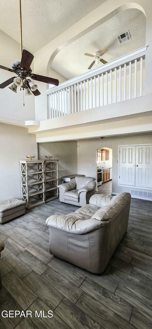 6236 Grace Madriles Pl, El Paso, TX 79932 - living area featuring wood finished floors, visible vents, a textured ceiling, and ceiling fan