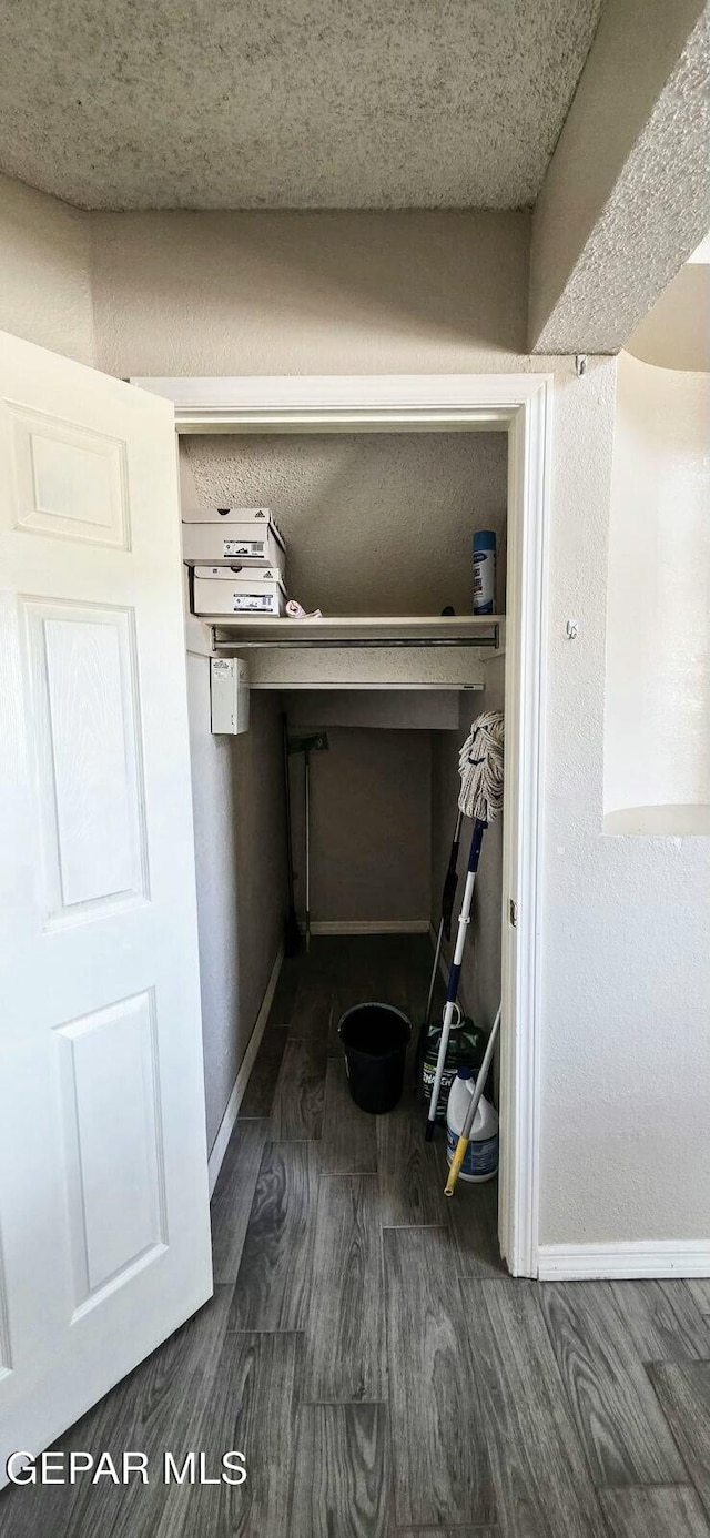 6236 Grace Madriles Pl, El Paso, TX 79932 - details with baseboards and wood finished floors