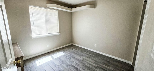 6236 Grace Madriles Pl, El Paso, TX 79932 - unfurnished room with baseboards and dark wood-style floors