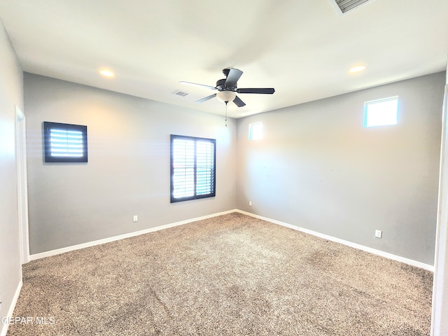 unfurnished room with carpet flooring, recessed lighting, a ceiling fan, and baseboards