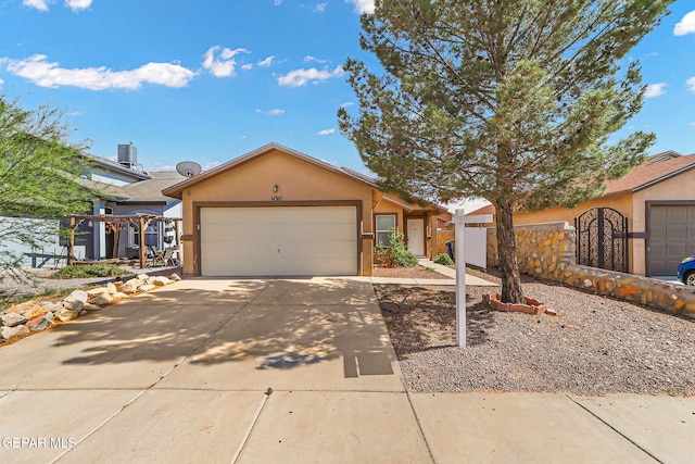 14310 Pacific Point Dr, El Paso, TX 79938 - single story home with driveway, stucco siding, and a garage