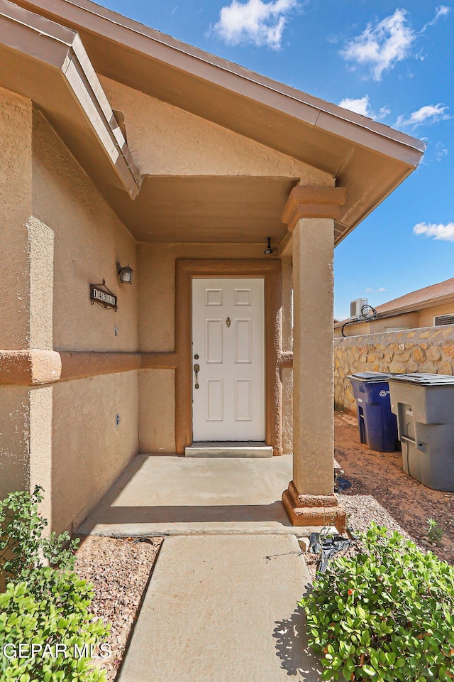 14310 Pacific Point Dr, El Paso, TX 79938 - doorway to property featuring stucco siding
