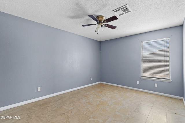 14310 Pacific Point Dr, El Paso, TX 79938 - unfurnished room featuring a ceiling fan, a textured ceiling, and baseboards