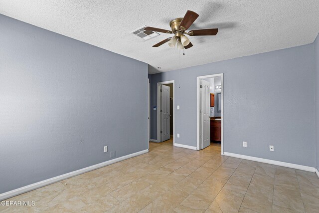 14310 Pacific Point Dr, El Paso, TX 79938 - empty room featuring a ceiling fan, a textured ceiling, and baseboards