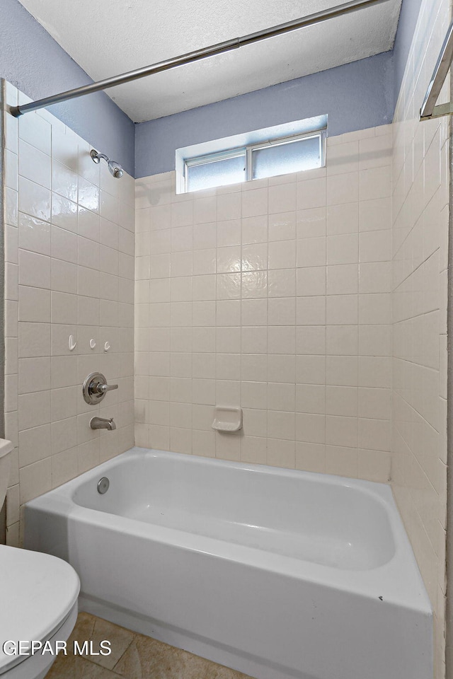 14310 Pacific Point Dr, El Paso, TX 79938 - full bathroom with toilet, tile patterned flooring, and  shower combination