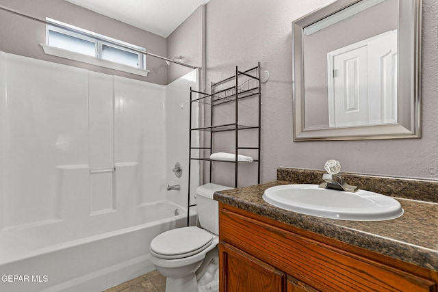 14310 Pacific Point Dr, El Paso, TX 79938 - full bath with vanity, toilet, tub / shower combination, a textured wall, and tile patterned flooring
