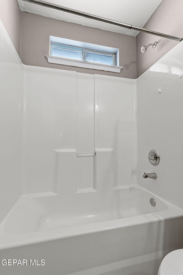 14310 Pacific Point Dr, El Paso, TX 79938 - bathroom featuring shower / tub combination and toilet