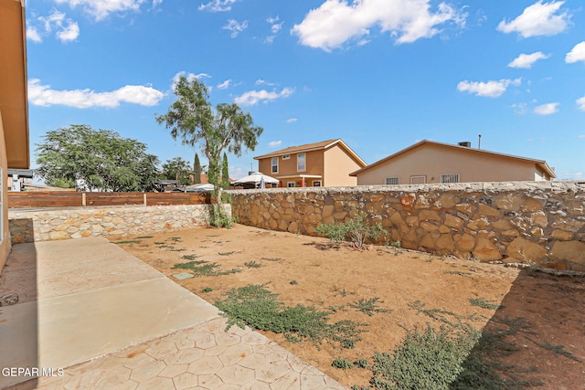 14310 Pacific Point Dr, El Paso, TX 79938 - fenced backyard with a patio area