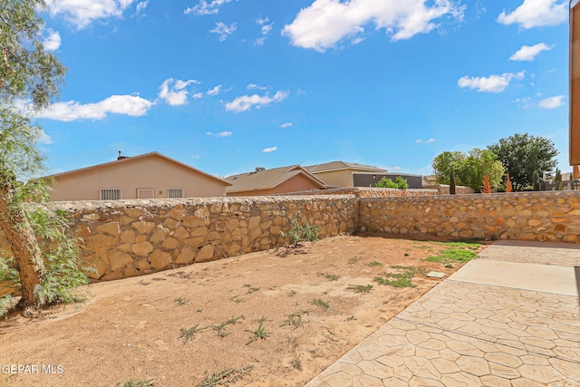 14310 Pacific Point Dr, El Paso, TX 79938 - fenced backyard featuring a patio