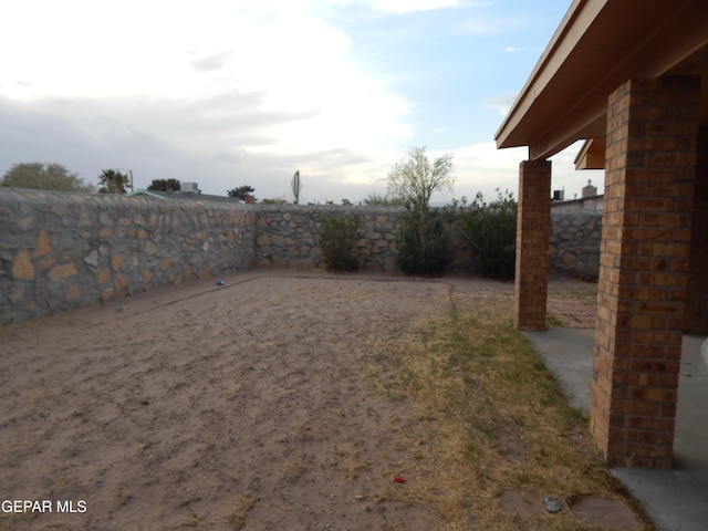 view of yard featuring a fenced backyard