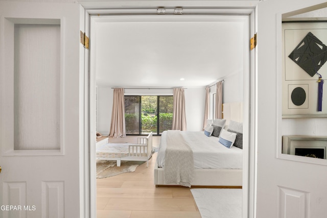 bedroom featuring wood finished floors
