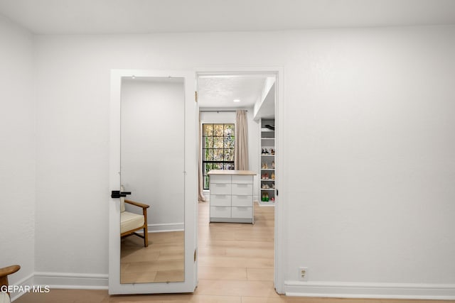 spacious closet with light wood-type flooring