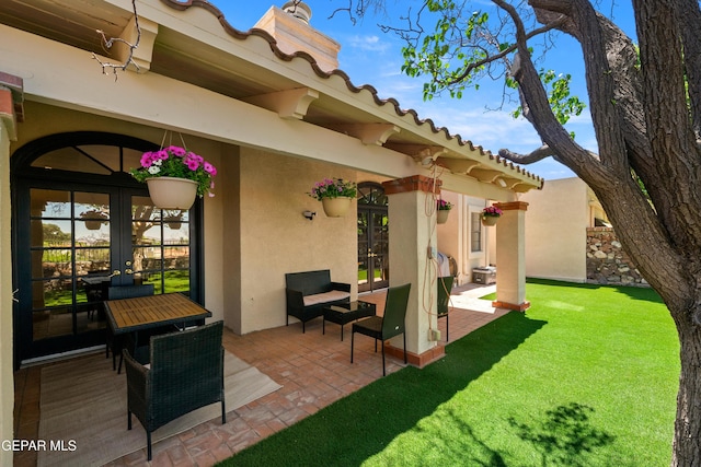 view of patio featuring french doors