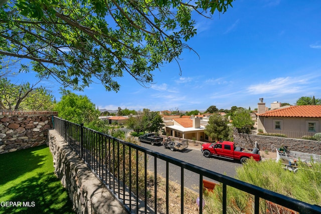 balcony featuring a residential view