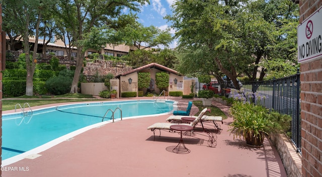 community pool with fence