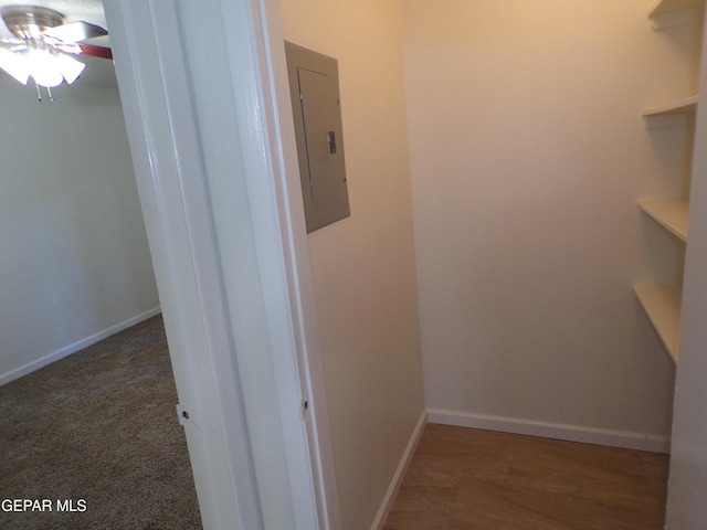 interior space featuring a ceiling fan and electric panel