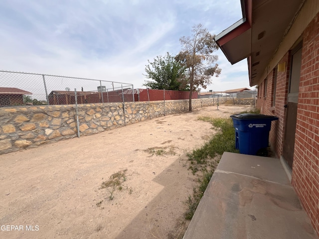 view of yard featuring fence