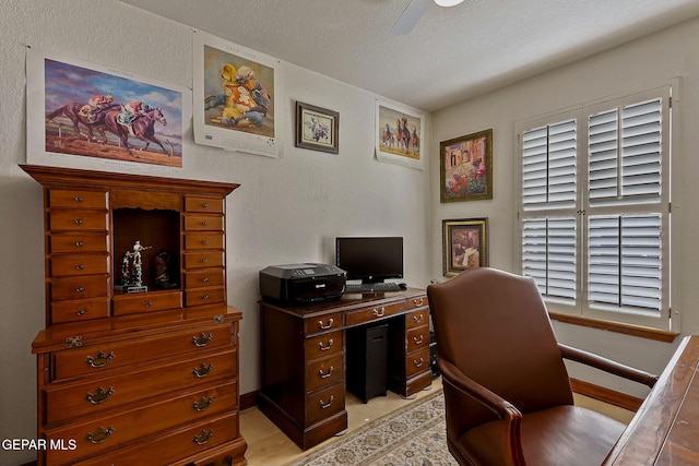 office space featuring a textured ceiling