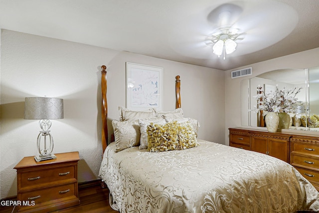 628 Spring Crest Dr, El Paso, TX 79912 - bedroom with visible vents and dark wood-style floors