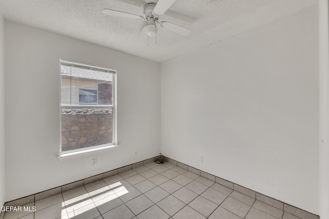 2352 Tierra Blanda Dr, El Paso, TX 79938 - unfurnished room featuring a ceiling fan, a textured ceiling, and light tile patterned flooring